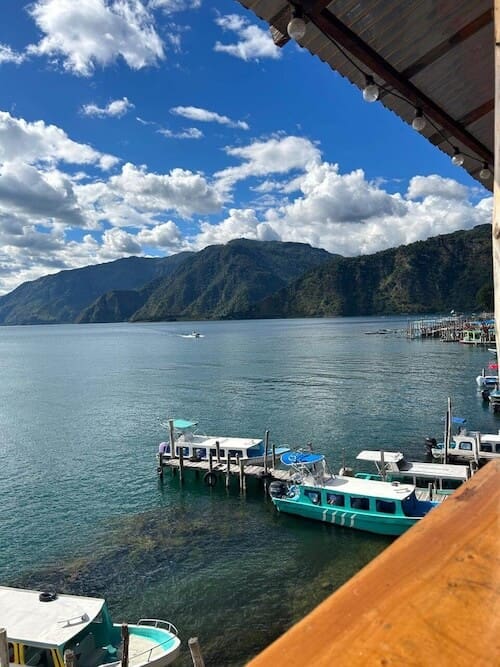 Water adventure travel in Lake Atítlan. Volcanoes on the background. 