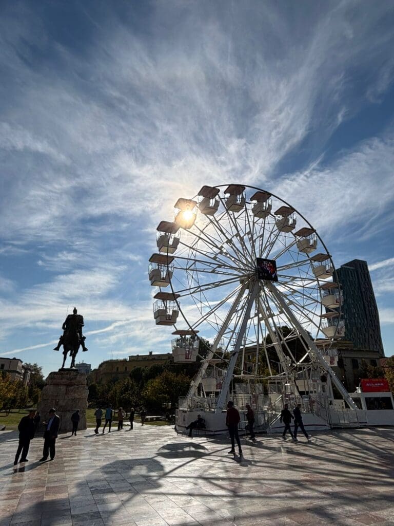 On day one in our Tirana two day itinerary we visited Skanderbeg Square. The statue and ferris wheel are pictured here 